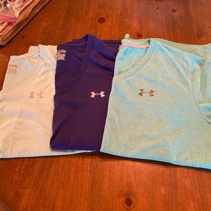 3 women’s loose fit athletic shirts